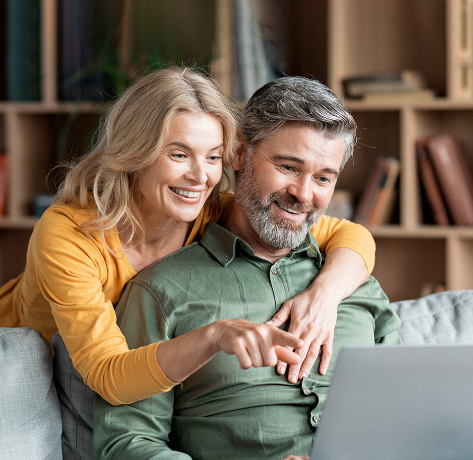 happy-couple-using-laptop-video-chat-3