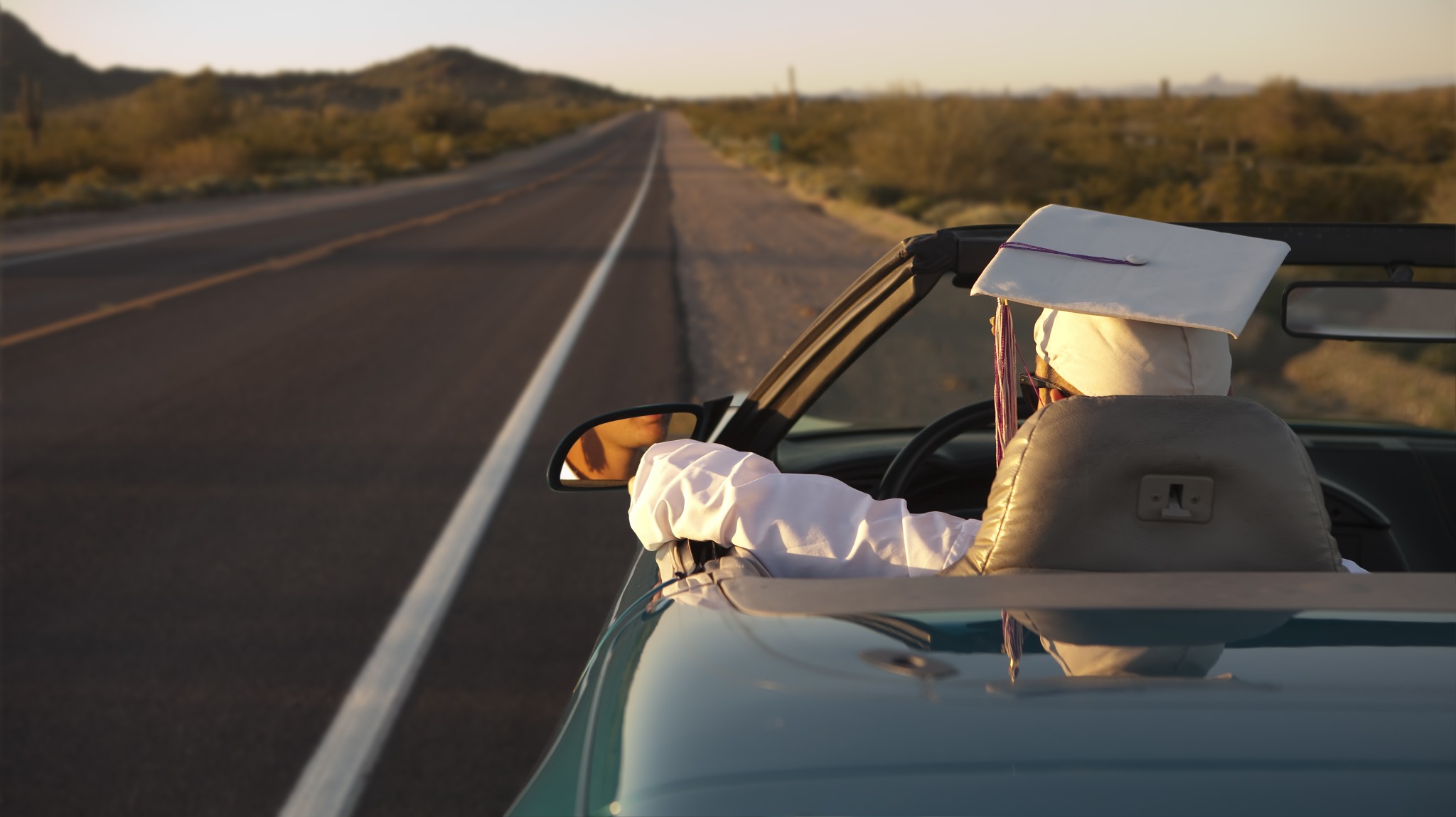 A man driving a car.