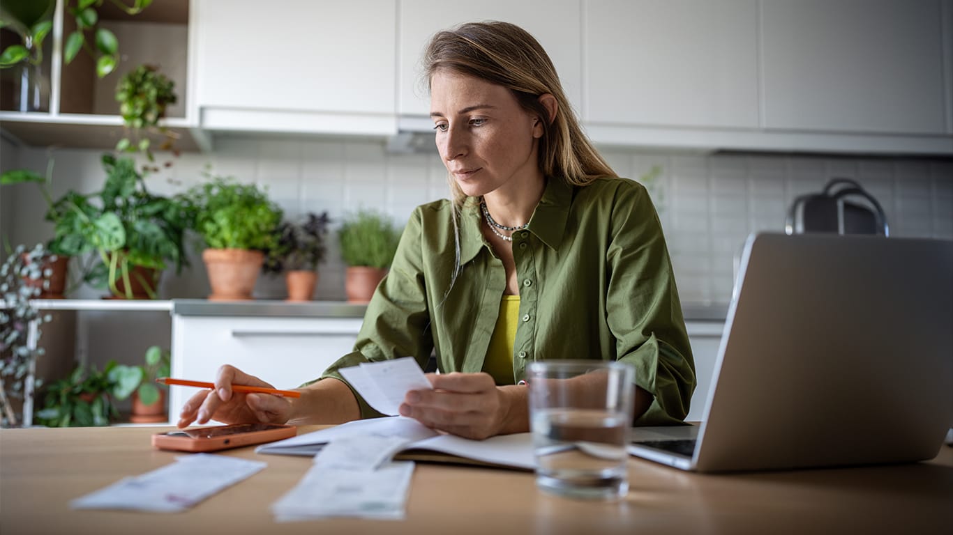 woman looking at her finances