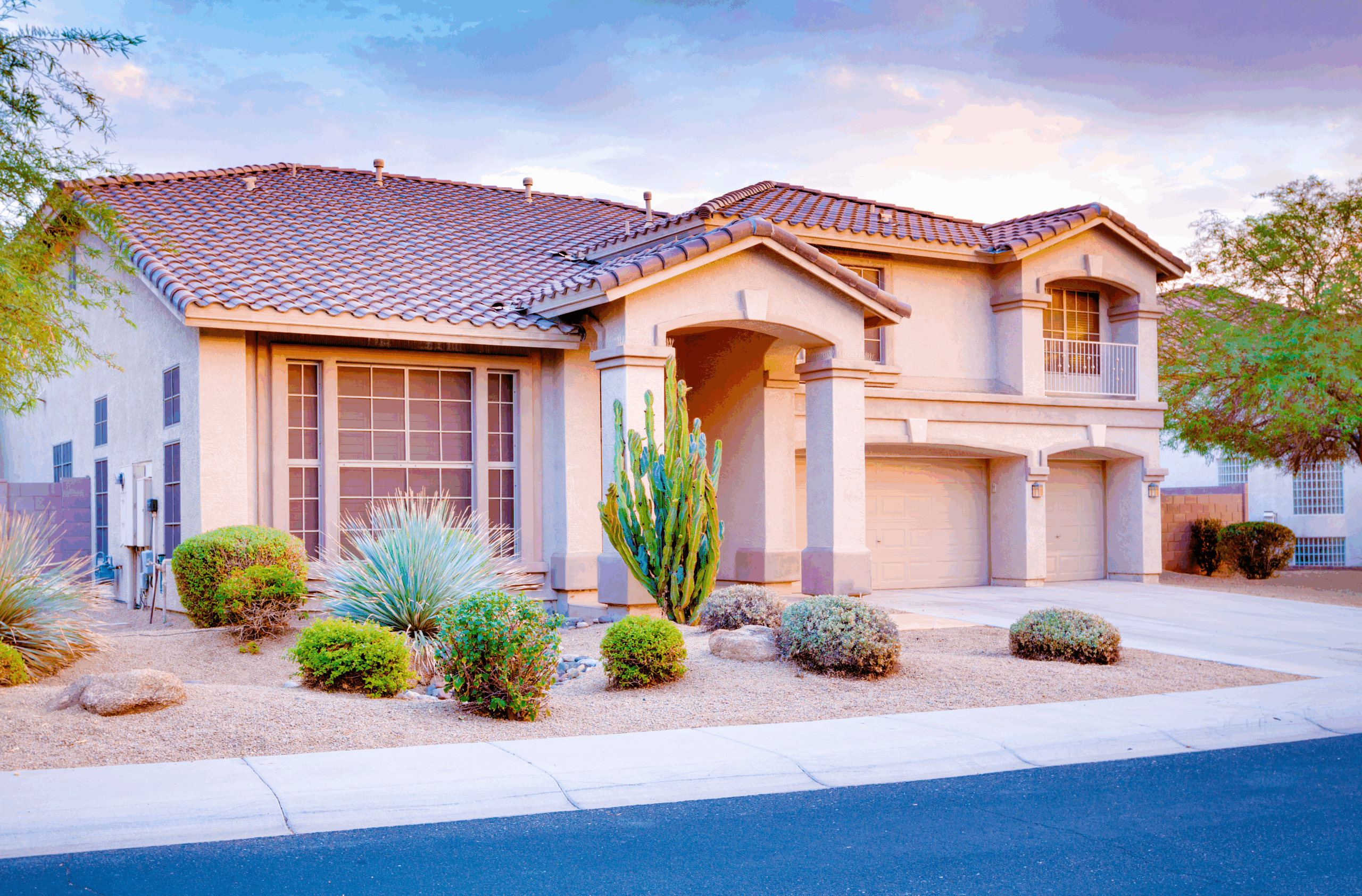 Side view of a luxury two-story desert home with modern design
